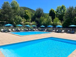 Campings Village de chalets et camping La Pierre de l'Aigle : photos des chambres