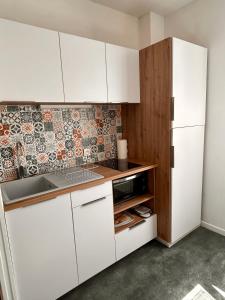Appartements 17 Rue du Puits de la Place : photos des chambres