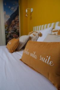 Appartements Dolcevita Suite - Signature italienne avec spa et filet : photos des chambres