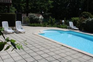 Maisons de vacances Gites La Garrigue 15 minutes Sarlat & Lascaux avec 2 piscines : photos des chambres