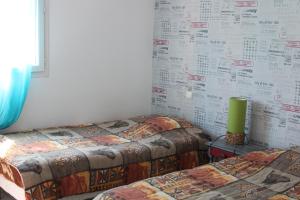Maisons de vacances Gites La Garrigue 15 minutes Sarlat & Lascaux avec 2 piscines : photos des chambres
