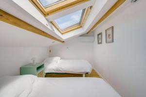 Maisons d'hotes La maison du port – Maison avec piscine a La Teste : photos des chambres