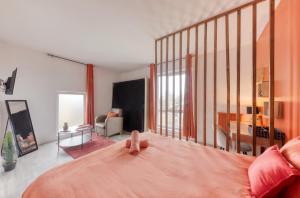 Sejours chez l'habitant Chambre orange 4 : photos des chambres