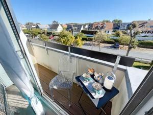 Appartements La croisette - a 50 metres de la plage de Juno Beach avec Balcon et Stationnement gratuit : photos des chambres