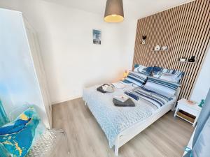 Appartements La croisette - a 50 metres de la plage de Juno Beach avec Balcon et Stationnement gratuit : photos des chambres
