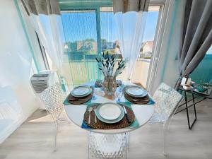 Appartements La croisette - a 50 metres de la plage de Juno Beach avec Balcon et Stationnement gratuit : photos des chambres