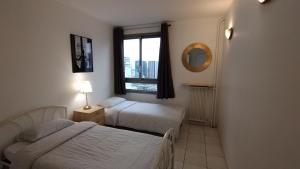 Appartements 3 bedrooms and salon, La Defense, 5 min walk Metro : photos des chambres