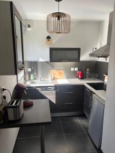 Appartements Le Paradis : photos des chambres