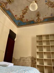 Chambre Lit Queen-Size avec Salle de Bains Commune