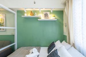 Serene Studio with Balcony, Sunset Views and City View