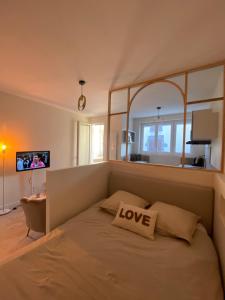 Appartements Les 20 bonheurs - Cosy pour 2 pers - Check-in 24-24 : photos des chambres