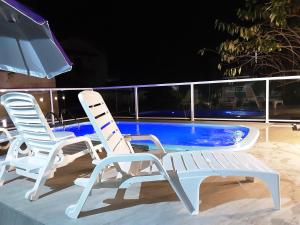 Casa de Praia Massaguaçu! Ao meio Áreas Arborizadas