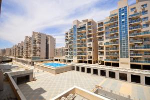 أبراج الداون التاون سيتي ايدج العالمين الجديده