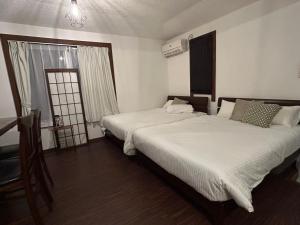 Pine house in Churaumi