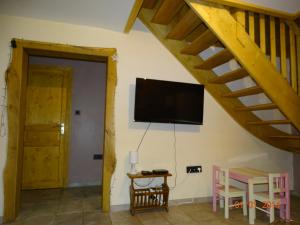 Chalets Le Chalet au vieux vignoble avec espace Sauna et Jacuzzi : photos des chambres