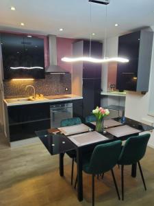 Appartements Mirka & Franck AIRCON Apartment Chic 4 Stars Parking Free, Garage & Wine with Avantages Pack : photos des chambres