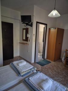 Kostas Studios Apartments - Ενοικιαζόμενα δωμάτια με κουζινάκι