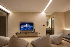 Ormus Villa - Beachfront Sanctuary Blending with Earth, Sun & Sea by etouri