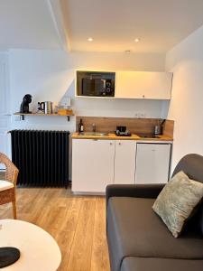 Appartements Le Quarante cinq -5 : photos des chambres