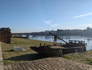 Appartements Au bord de la Dordogne : photos des chambres