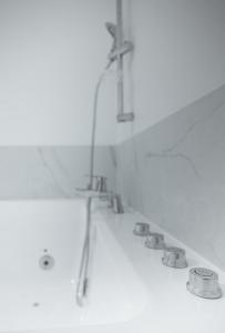 Appartements Semillon - Baignoire Balneo plein centre : photos des chambres