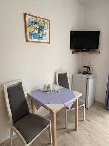 Pokoje i Apartamenty Ara Karwia