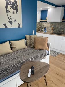 Appartements Appartement cosy avec piscine : photos des chambres