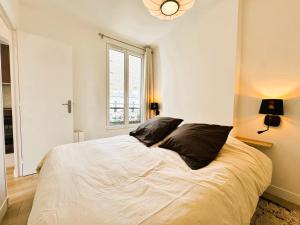 Appartements Appartement seduisant Paris - Clichy : photos des chambres