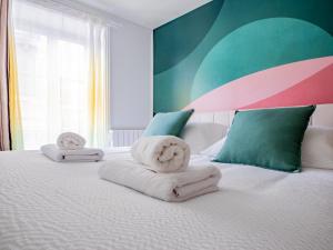 Appartements OIQIA • Advena • Canson : photos des chambres