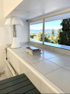 ÉLÉGANT STUDIO et PARKING DANS BATIMENT HISTORIQUE