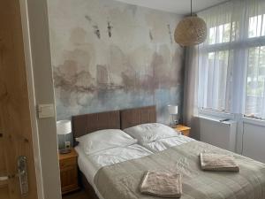 KAMERALNY przy promenadzie - domki, apartamenty, pokoje