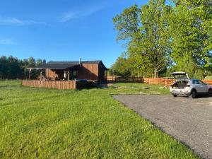 Drewniana ostoja, jacuzzi, sauna, basen - domek na wyłączność