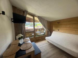 Appartements Appartement au pied des pistes : photos des chambres