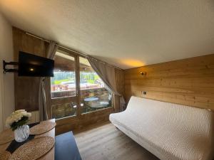 Appartements Appartement au pied des pistes : photos des chambres