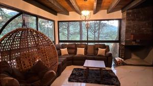 Hermosa cabaña en el bosque