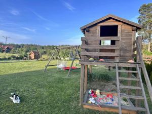 Wczasy Pod Sosnami domek z kominkiem