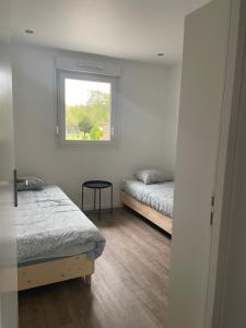 Appartements Appartement climatise neuf : photos des chambres