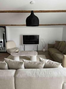 Appartements La Casa Familia - Plage a 10 min - Terrasse ensoleillee - 70m2 : photos des chambres