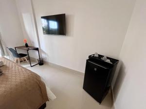 Suíte com jardim e piscina na Barra RJ