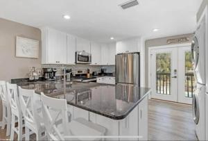 Across the street from the Beach By The Hang Out