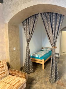 Historic studio apartment beneath the Ljubljana castle in the old city centre