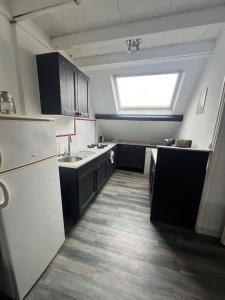 Appartements WingFlat Appartement Entier Centre Ville Proche Naval Cite de la mer Quartier Calme : photos des chambres