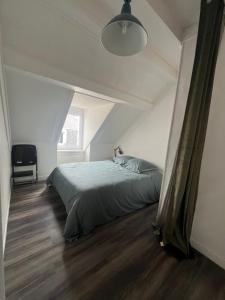 Appartements WingFlat Appartement Entier Centre Ville Proche Naval Cite de la mer Quartier Calme : photos des chambres