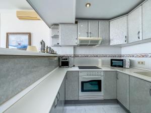 Coastal Comfort for Four in Torremolinos