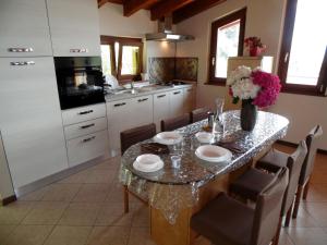 Villa in Pisogne with pool, garden and lake view