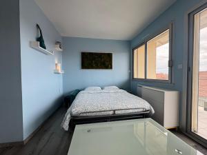 Appartements L-azur cosy studio Meyzieu : photos des chambres