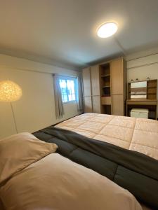 Spacious 2-storey apartment near beach in prime location