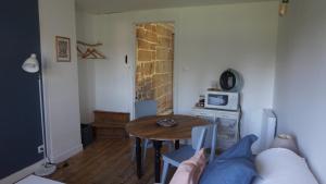 Appartements Chez Audrey & Fabien - Appartement avec terrasse : photos des chambres