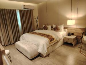 لؤلؤة الثريا للشقق المخدومة حي الملقا - تصنيف اقتصادي