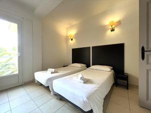 Appartements SAINT FLORENT - 3 Pieces dans residence avec piscine : photos des chambres